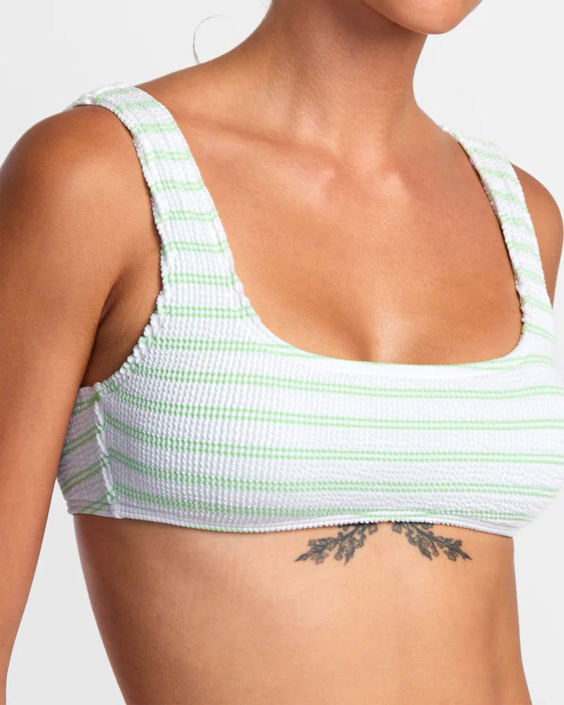 
                      
                        Front detail on the White Grooves Stripe Bralette Bikini Top by RVCA
                      
                    