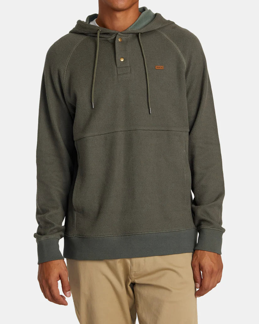 Front view of a man wearing the Olive Port Pullover Hoodie by RVCA