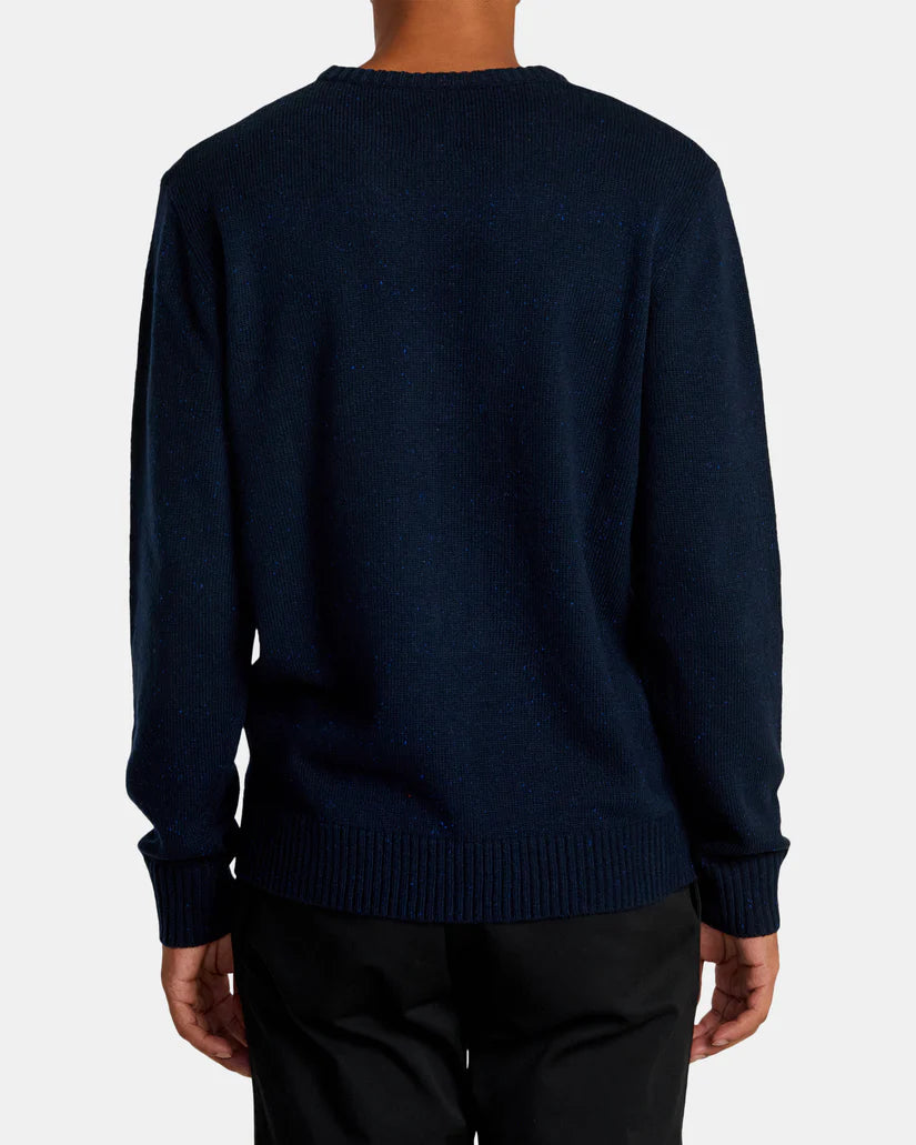 Back view of a man wearing the navy Alameda Crew Neck Sweater by RVCA