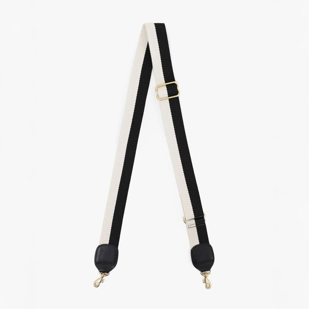 Black and white adjustable shoulder strap from the brand Clare V.