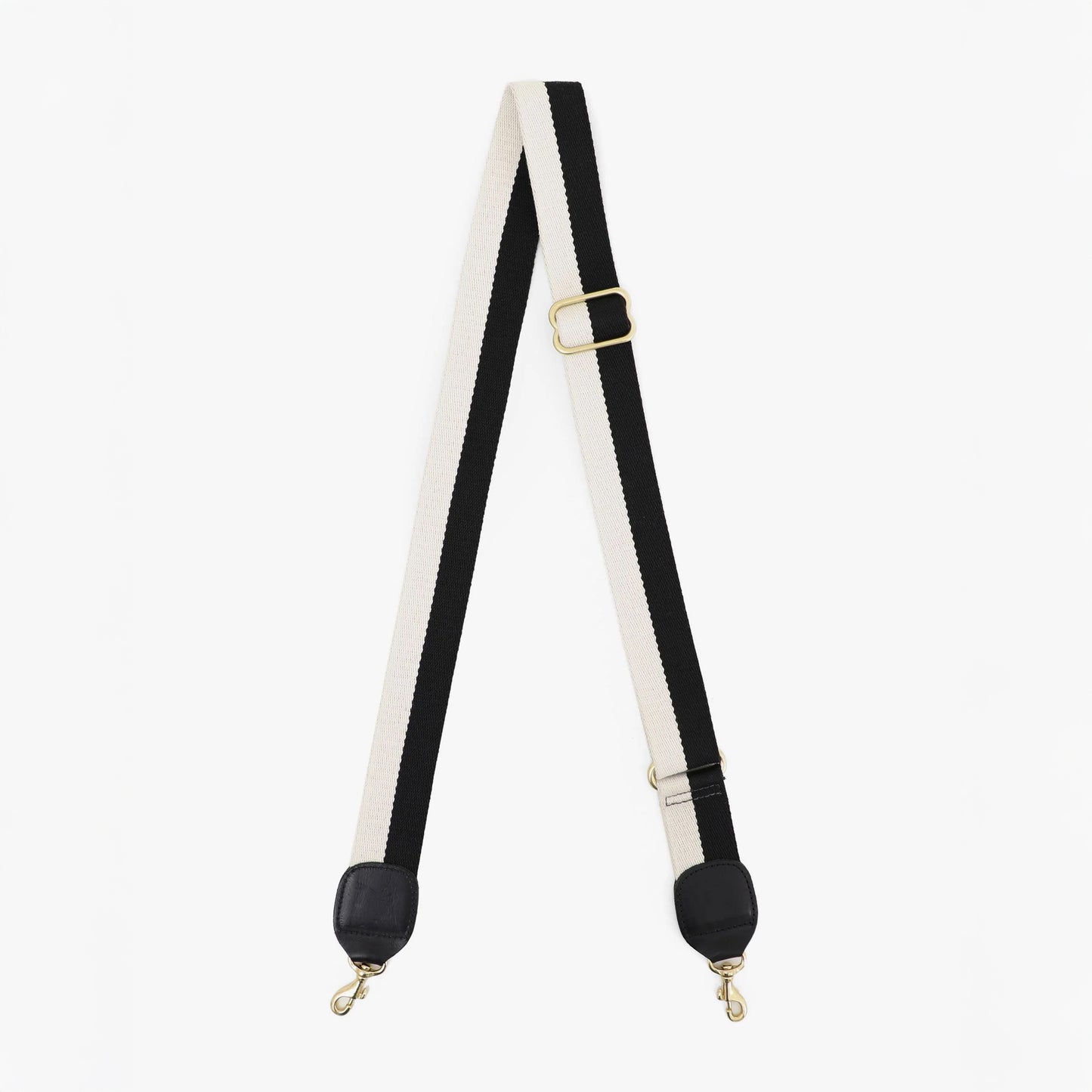 Black and white adjustable shoulder strap from the brand Clare V.