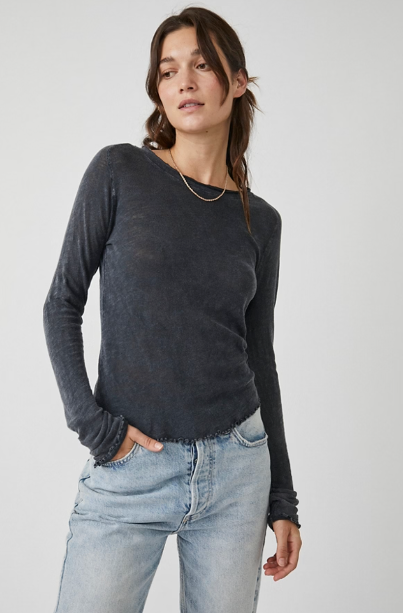 Front view of a woman wearing the Black Be My Baby Long Sleeve Tee by Free People