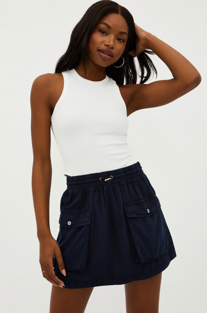 
                      
                        Front detail on the Nicoletta Mini Skirt by Beach Riot
                      
                    