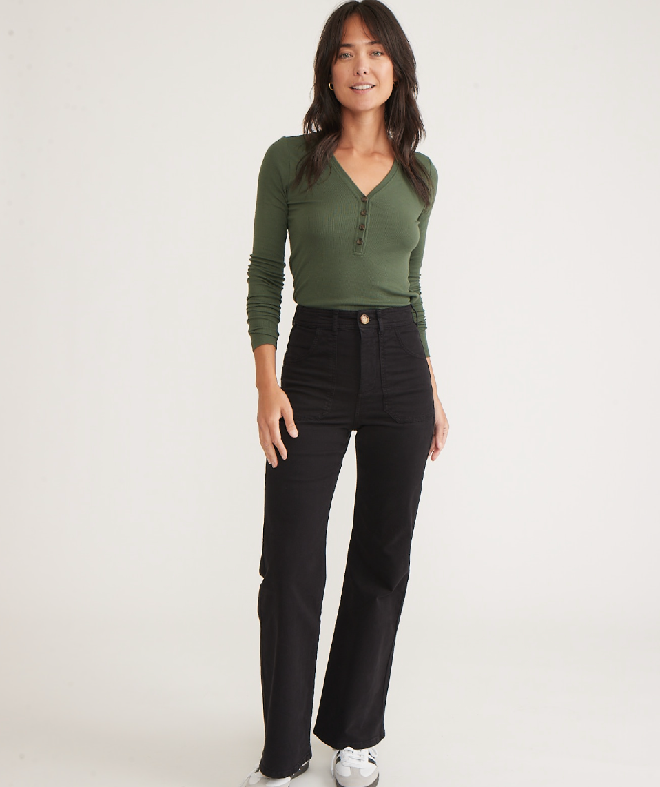 Front view of a woman wearing the Bridget India Ink Corduroy Flare Pant by Marine Layer