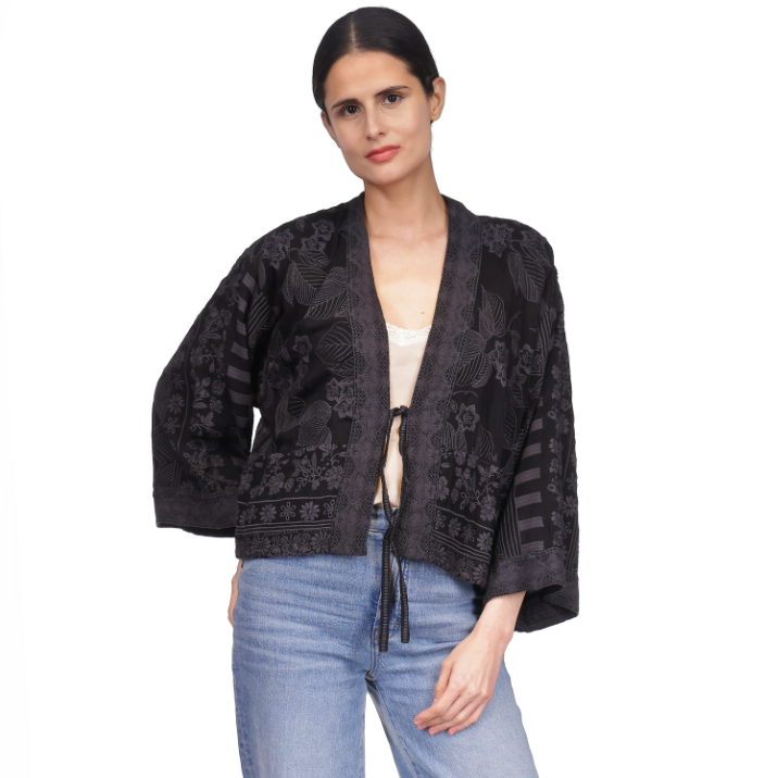 This charming kimono from Johnny Was features an intricate floral pattern with wide sleeves and a tie-front closure.