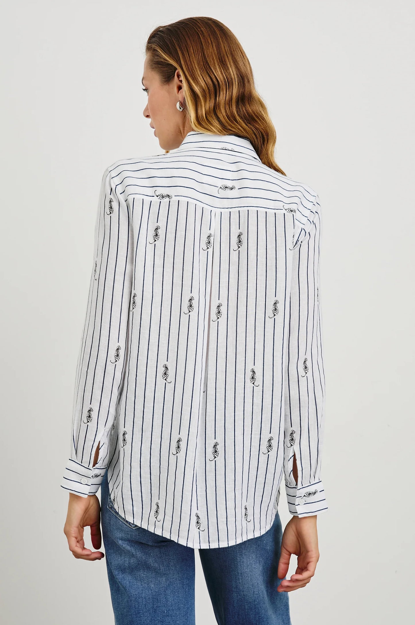 Back view of a woman wearing the Navy Striped Tigers Charli Button Down Shirt by Rail