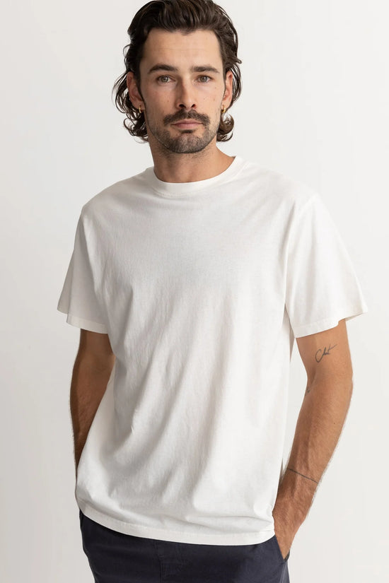 Front view of man wearing the Vintage White Classic Vintage Tee by Rhythm