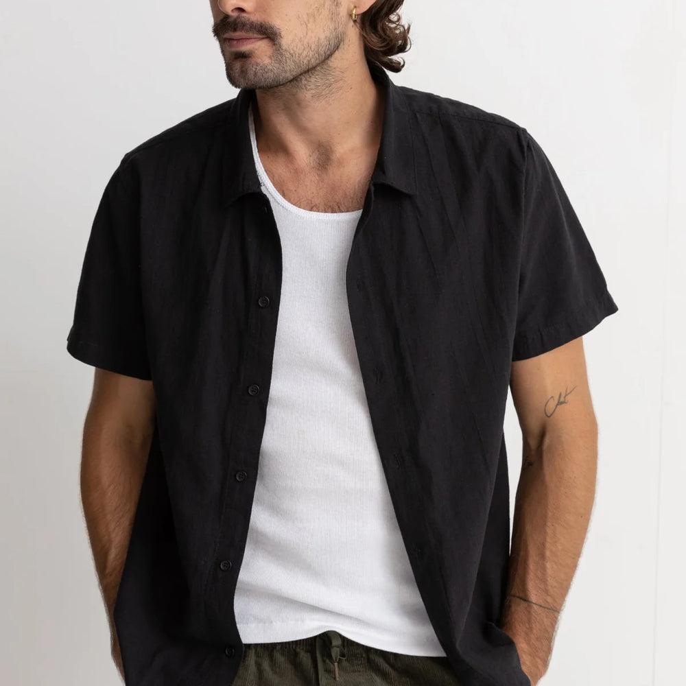 Front, unbuttoned view of the Classic Lienen Short Sleeve shirt in black by Rhythm