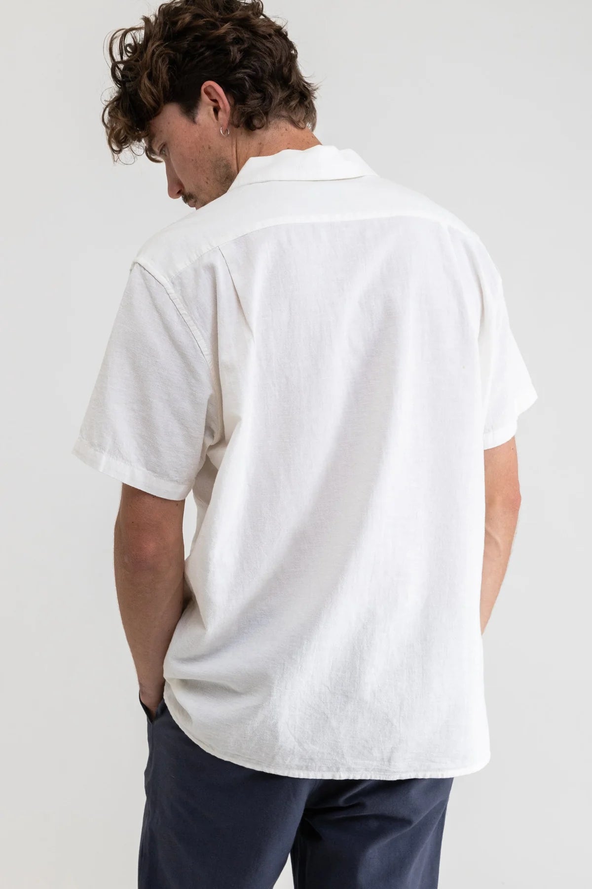 Back view of the white Classic Linen Short Sleeve Men's Shirt by Rhythm