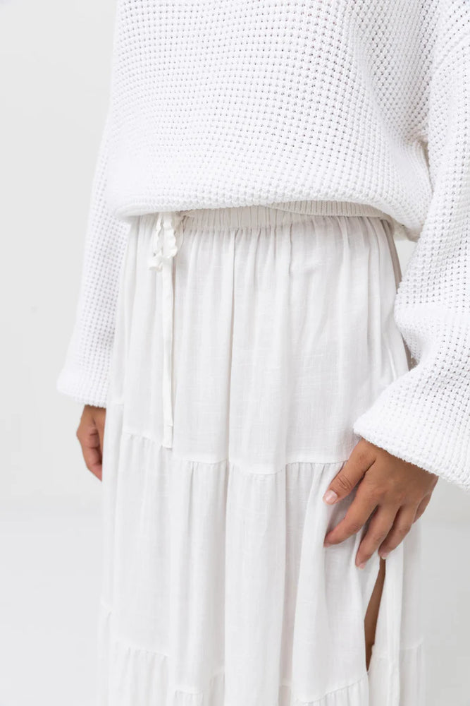 
                      
                        Front detail on the White Classic Tiered Maxi Skirt by Rhythm
                      
                    