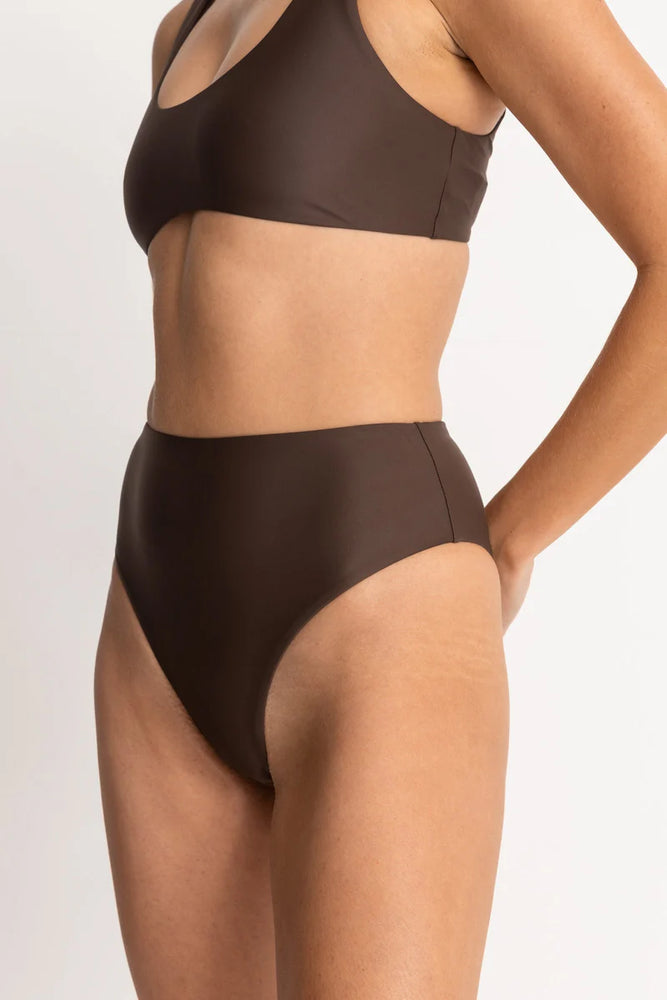 
                      
                        Brown bikini set on a plain background
                      
                    