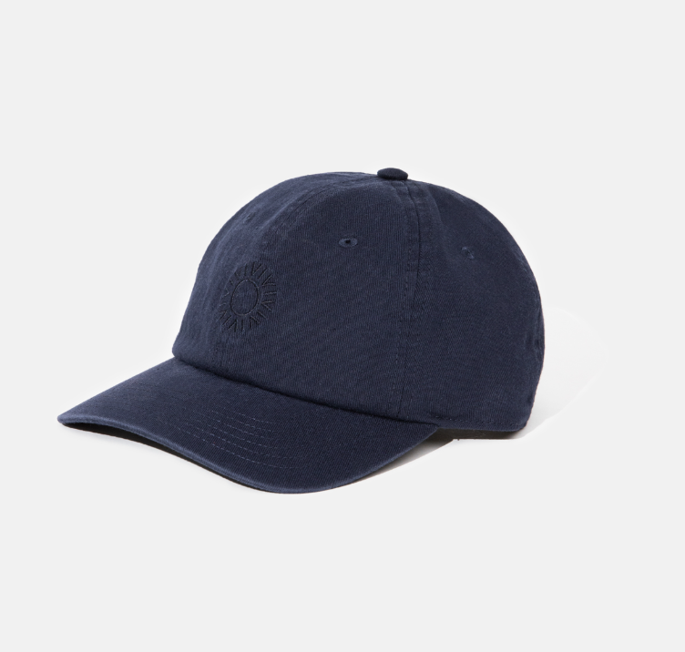 The Classic Cap by Rhythm is a vintage style 5 panel cap with a subtle sun embroidery on the front. Available to shop at Harbour Thread Burlington!