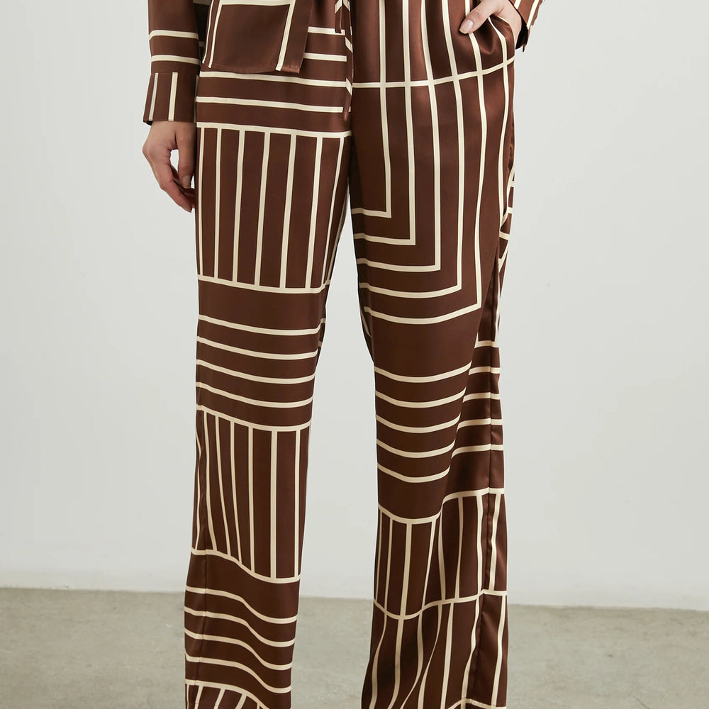 A playful alternative to jeans, these flowy full length pants from Rails are crafted from sheen twill with a retro-inspired print.