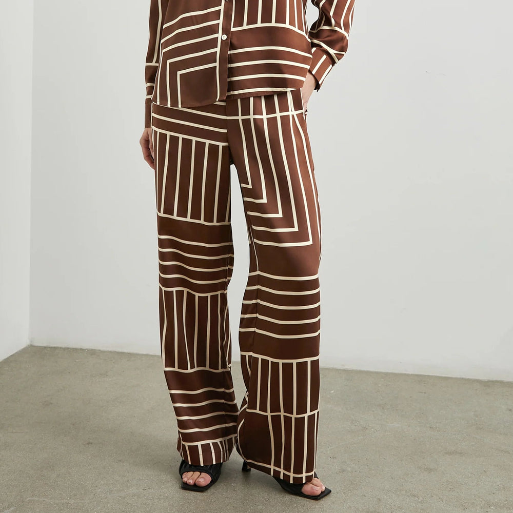 A playful alternative to jeans, these flowy full length pants from Rails are crafted from sheen twill with a retro-inspired print.