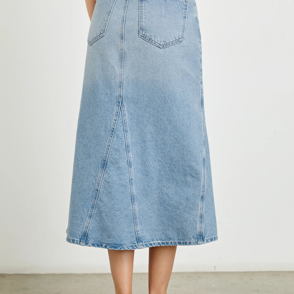 
                      
                        The Del Rey denim midi skirt from Rails features classic back pockets
                      
                    