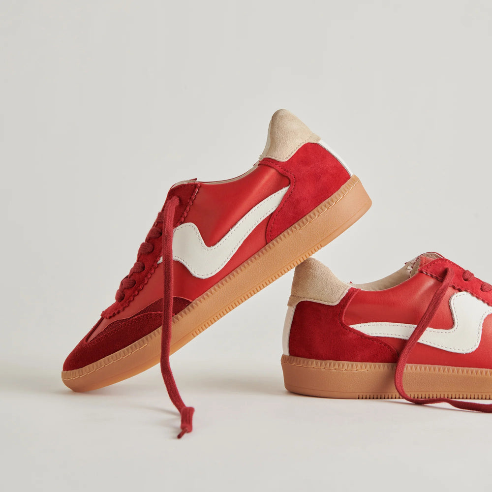 Red and white athletic-inspired sneakers from Dolce Vita