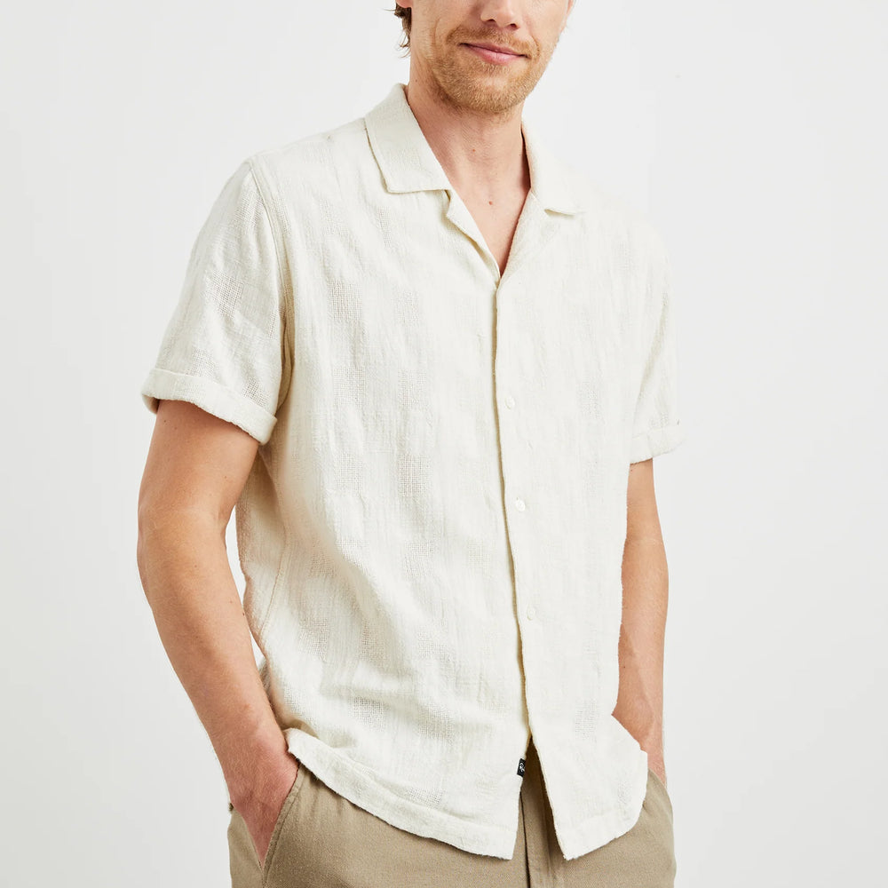 The Dresden Shirt from Rails offers a classic button down silhouette with short sleeves and a unique dobby texture. This casual men's shirt is available at Harbour Thread St. Pete!