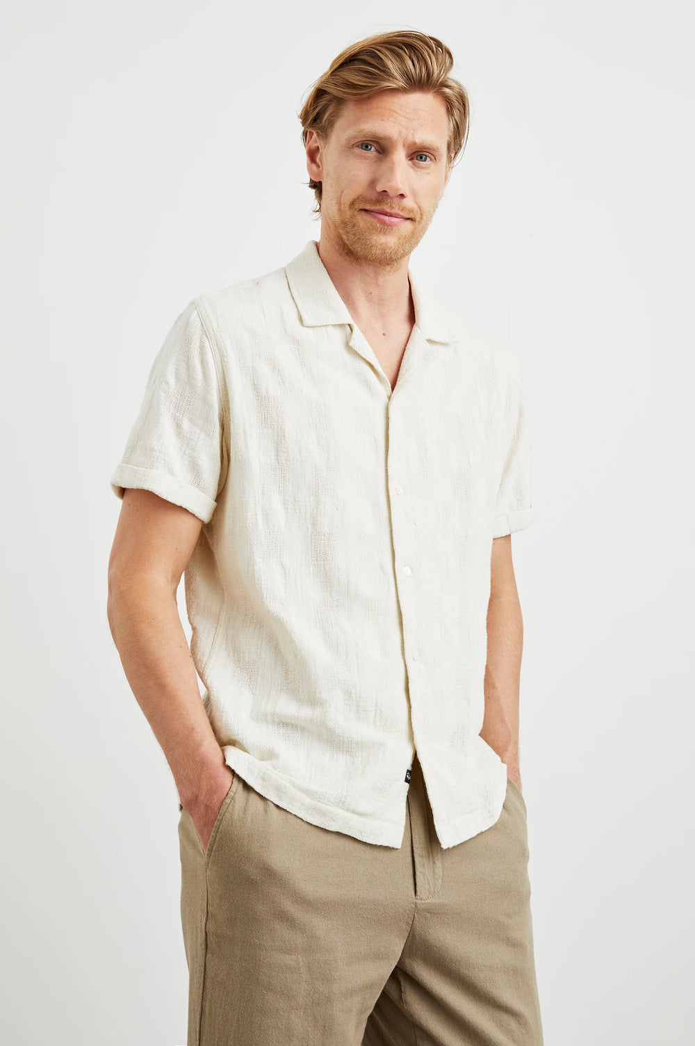 The Dresden Shirt from Rails offers a classic button down silhouette with short sleeves and a unique dobby texture. This casual men's shirt is available at Harbour Thread St. Pete!