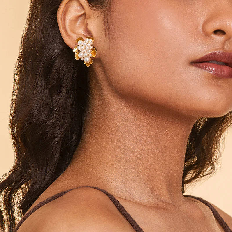 
                      
                        Deepa Gurnani's gold and pearl Nea Earrings are a unique go-to for holiday events and special occasions
                      
                    