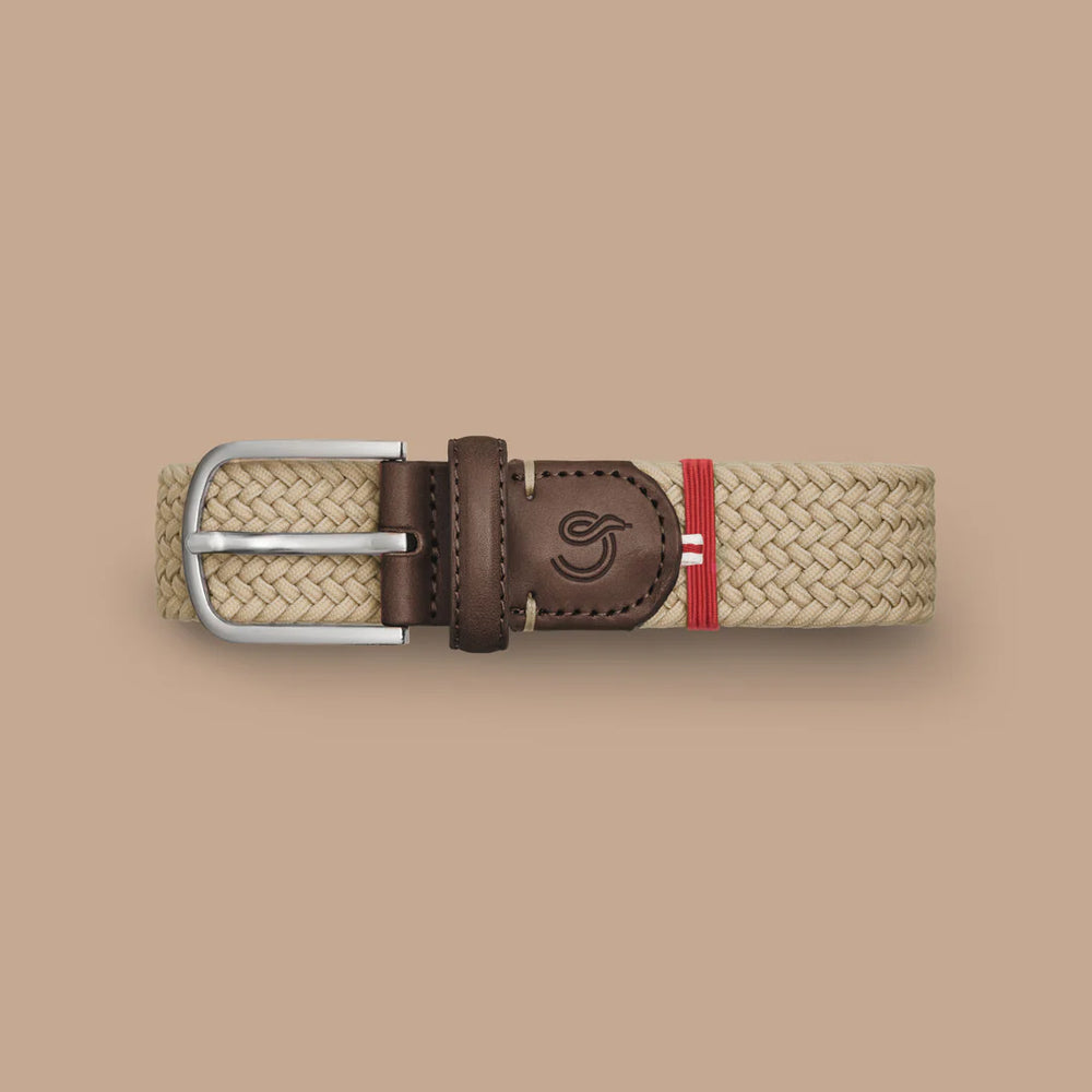 
                      
                        the Dubai La Boucle belt, braided in the color Beige
                      
                    