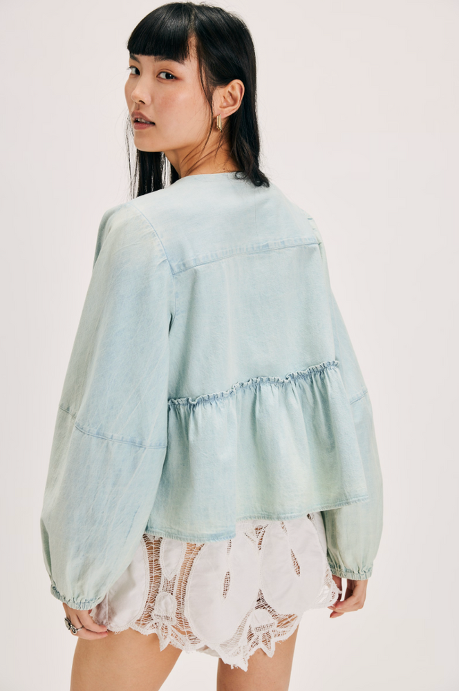 
                      
                        Free People's Denim Brunch Babe Blouse in the color Light Tint Wash is available at Harbour Thread. 
                      
                    