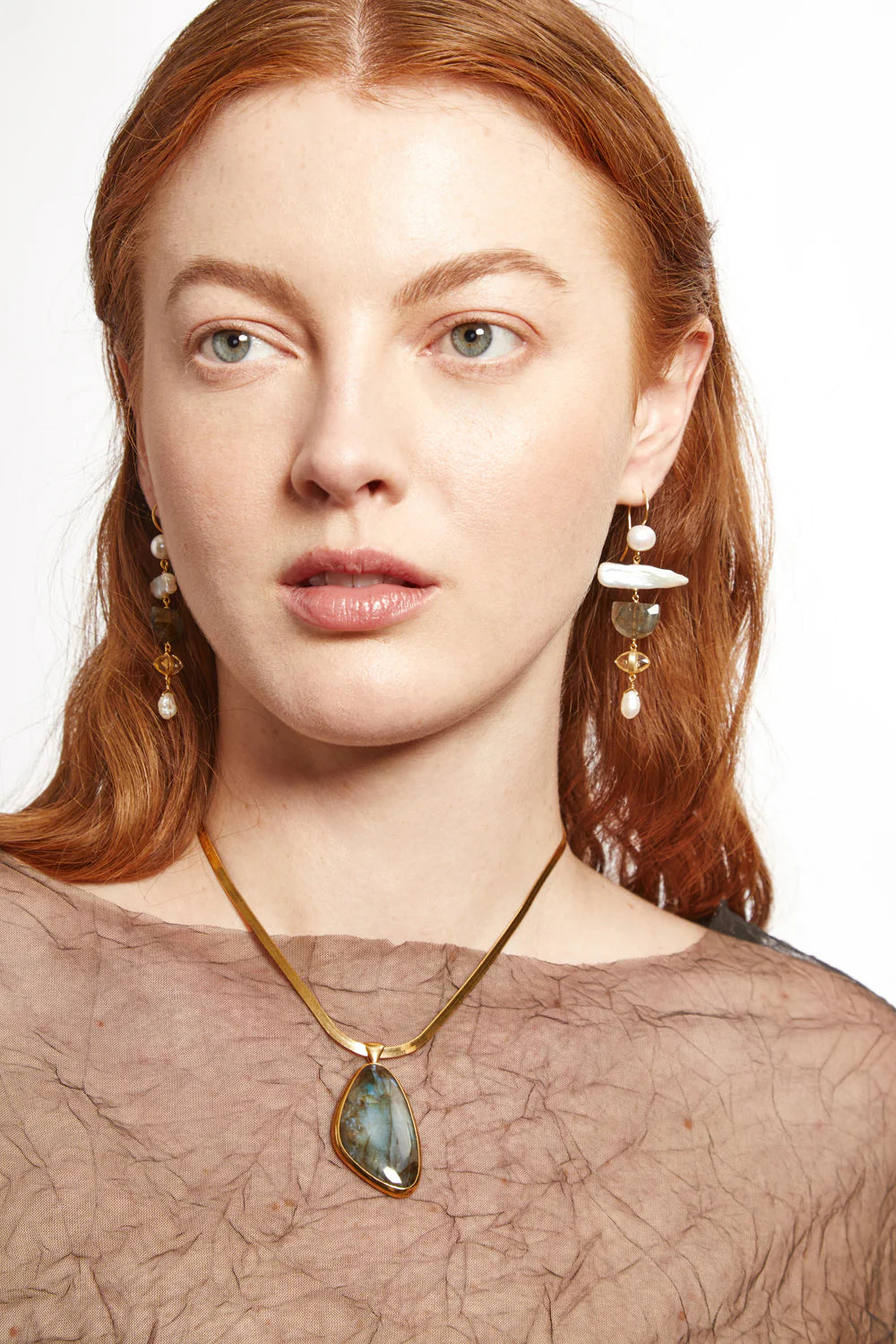 Woman wearing the White Pearl Mix Sierra Drop Earrings by Chan Luu