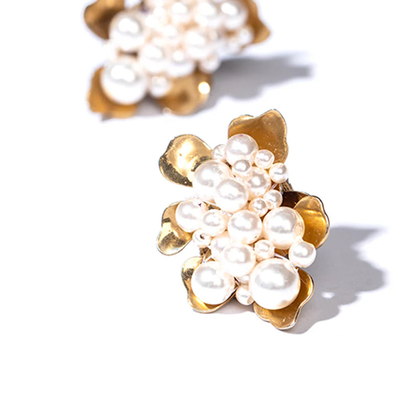 
                      
                        Design detail on the Nea Earrings by Deepa Gurnani in the color Gold
                      
                    