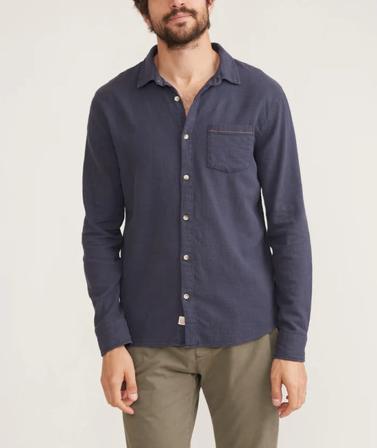 Front view of men's dark blue long sleeve button up shirt