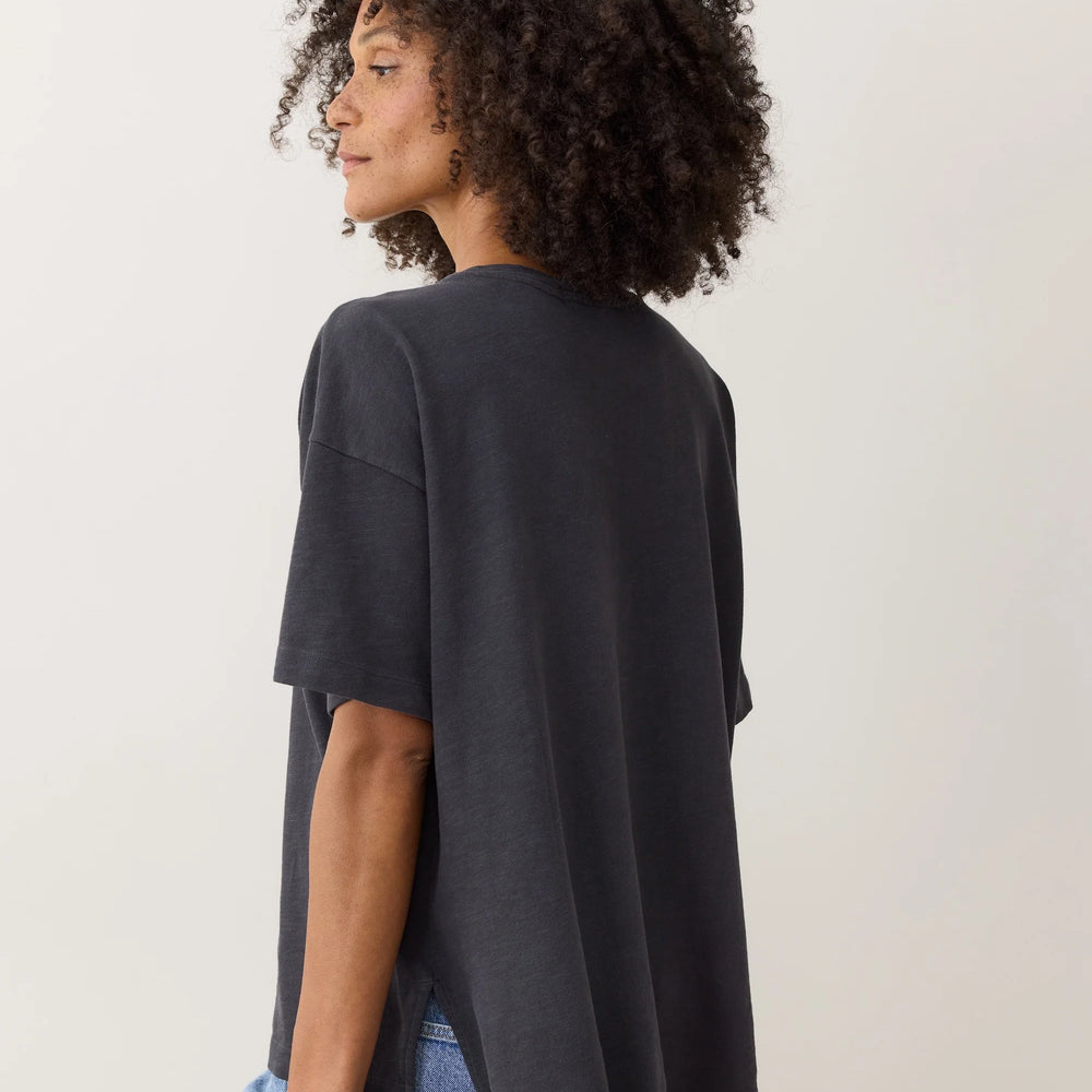 Woman wearing a black oversized t-shirt from Marine Layer