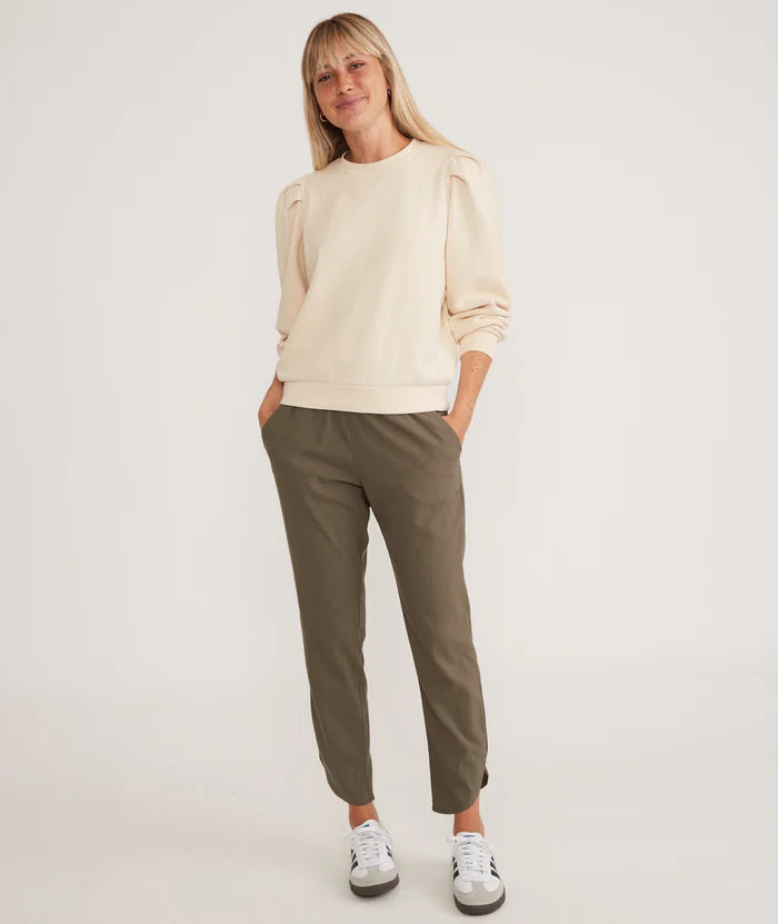 Front full length view of the Marine Layer Allison Pant in the color Dusty Olive