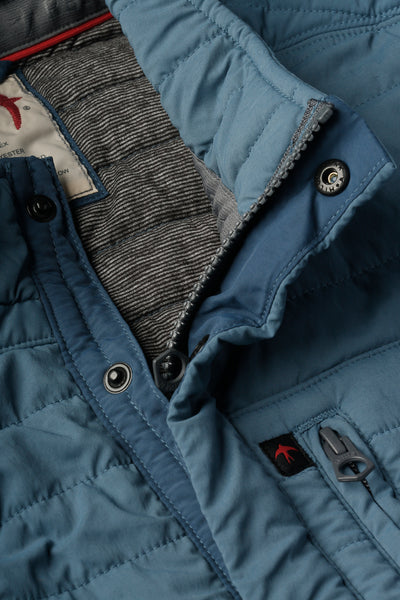 
                      
                        Design detail on the Gas Blue Windzip Jacket by Relwen
                      
                    