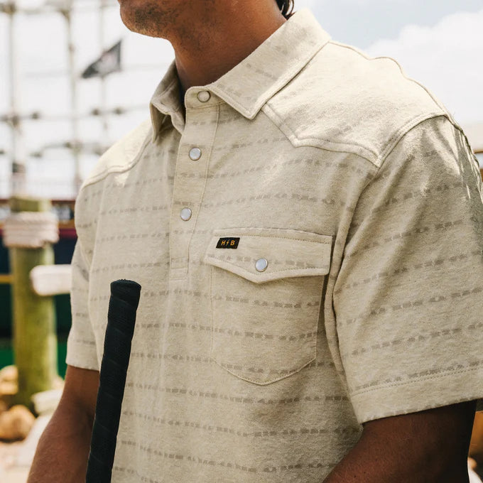
                      
                        Front detail on the Chiba Jacquard Creme Ranchero Jacquard Polo by Howler Bros
                      
                    
