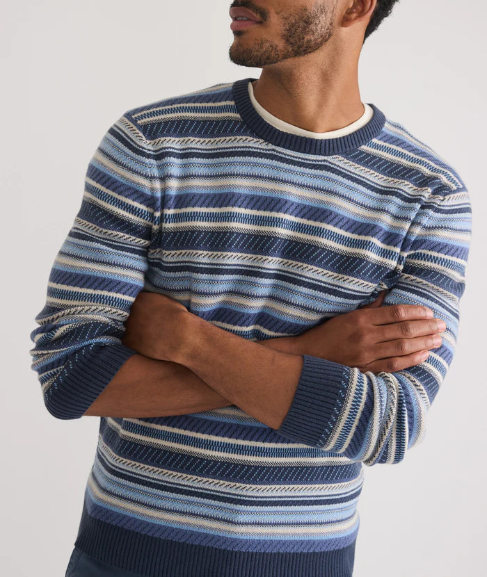 Front view of a man wearing the Blue Stripe Reed Jacquard Sweater by Marine Layer