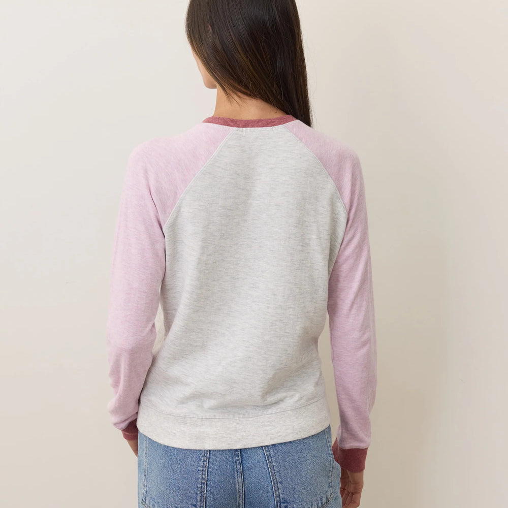 
                      
                        Woman wearing a long sleeve baseball tee from Marine Layer
                      
                    