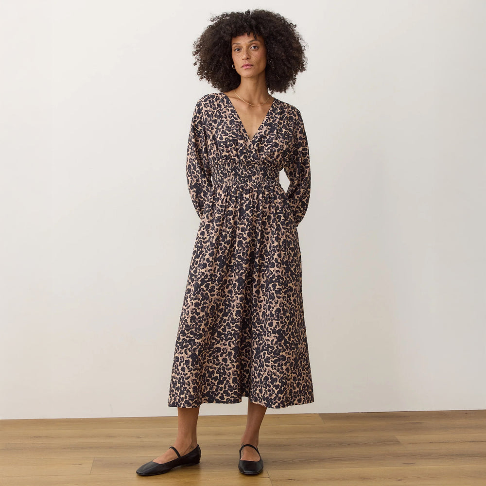 Woman wearing the Marine Layer Daphne Maxi Dress in the color Leopard