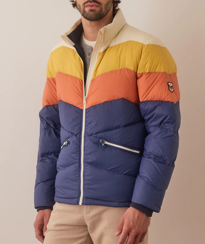 Playful retro features like chevron paneling and colorblocking meet functional features with Marine Layer's old-school cool Puffer Jacket.