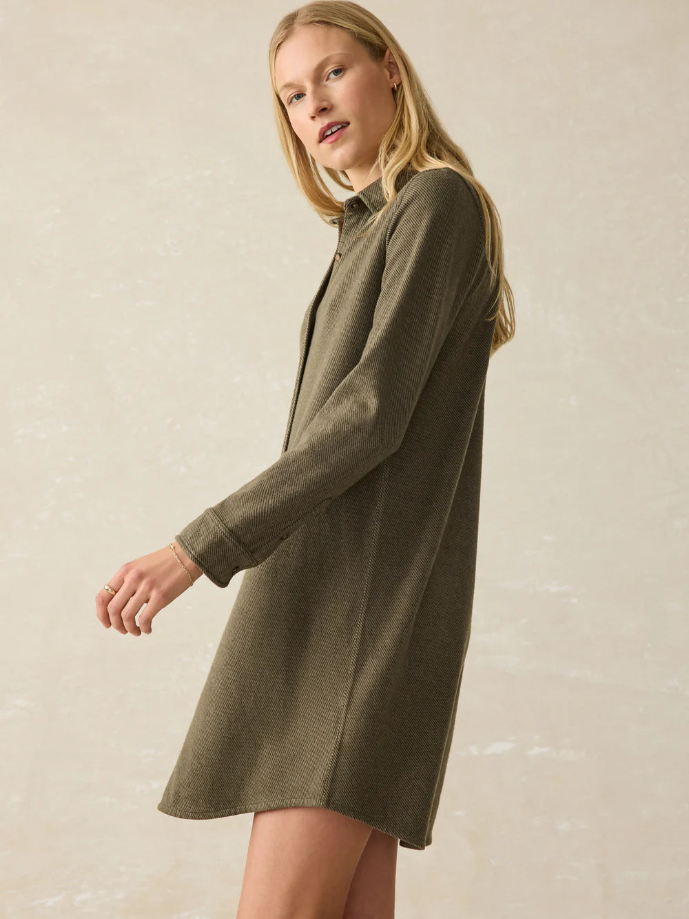 Side view of the Olive Melange Twill Legend Sweater Dress by Faherty