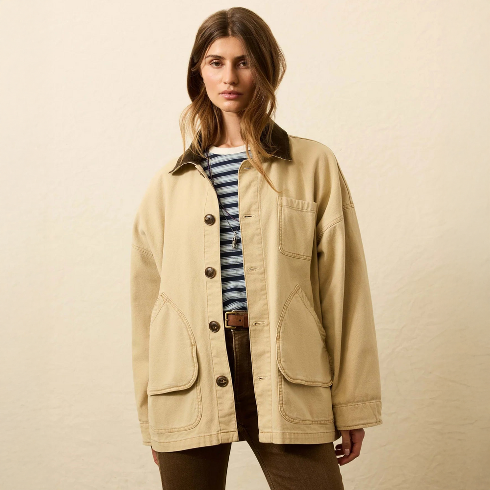 Woman wearing the Faherty Sunwashed Canvas Barn Jacket