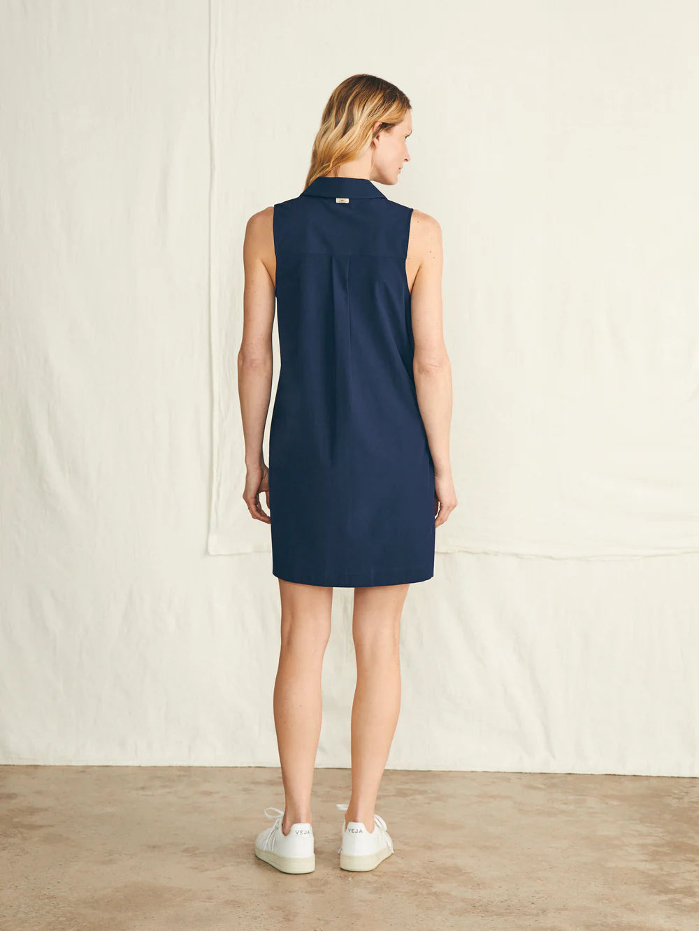 Back view of the Navy All Day Polo Dress by Faherty