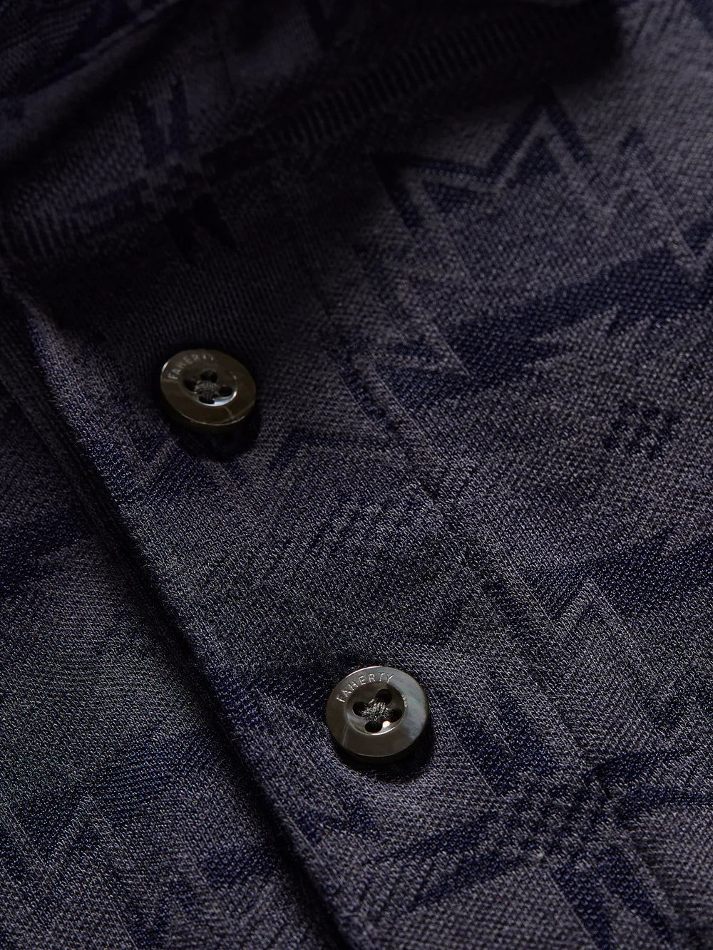 Design detail on the Night River Stars Movement Short Sleeve Pique Polo Shirt by Faherty x Doug Good Feather