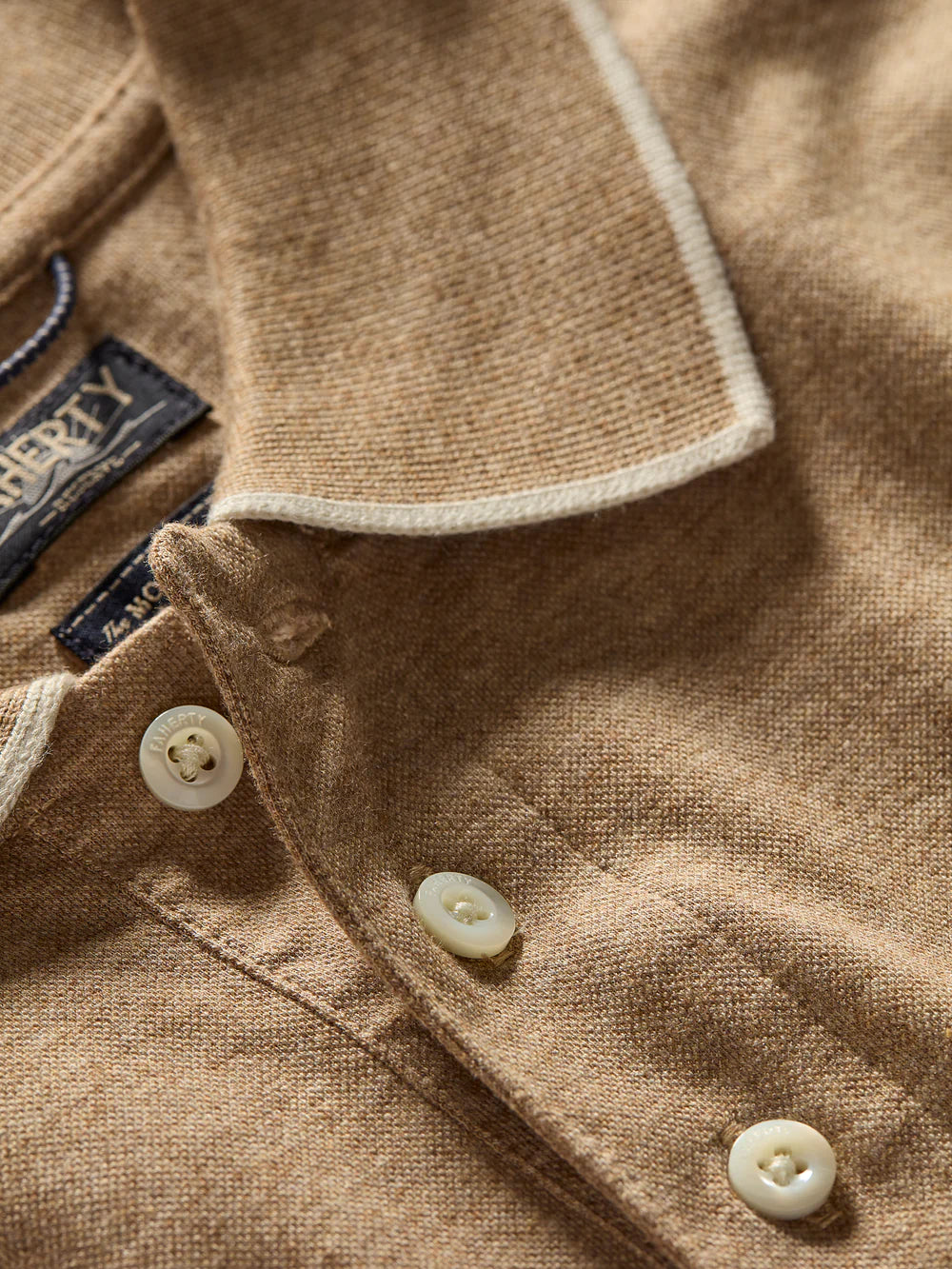 Design detail on the collar and button placket for the Driftwood Island Heather Movement Short Sleeve Pique Polo Shirt by Faherty