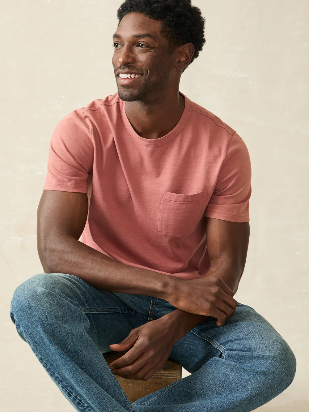 The Men's Sunwashed Pocket Tee by Faherty, in the color Fall Red