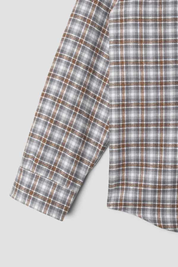 
                      
                        Sleeve detail on the Grey Plaid Long Sleeve Flannel Shirt by the brand Stan Ray. 
                      
                    