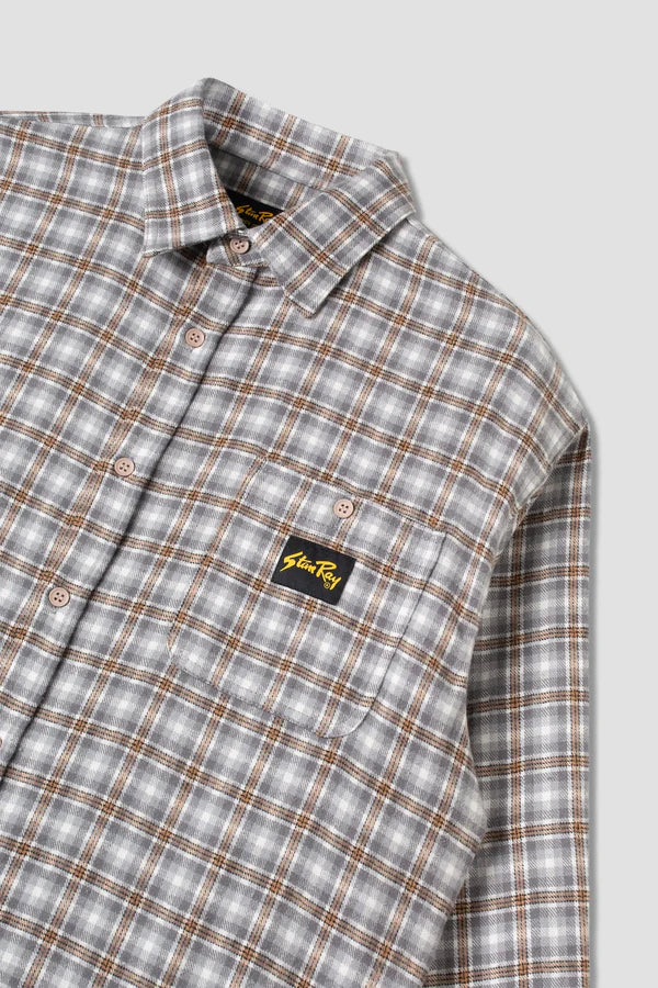 Front design detail on the Grey Plaid Long Sleeve Flannel Shirt by the brand Stan Ray. 