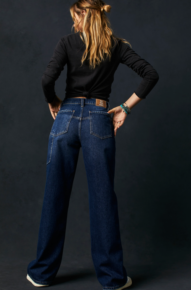 Back view of the dark wash Tinsley Baggy High Rise Jeans by Free People