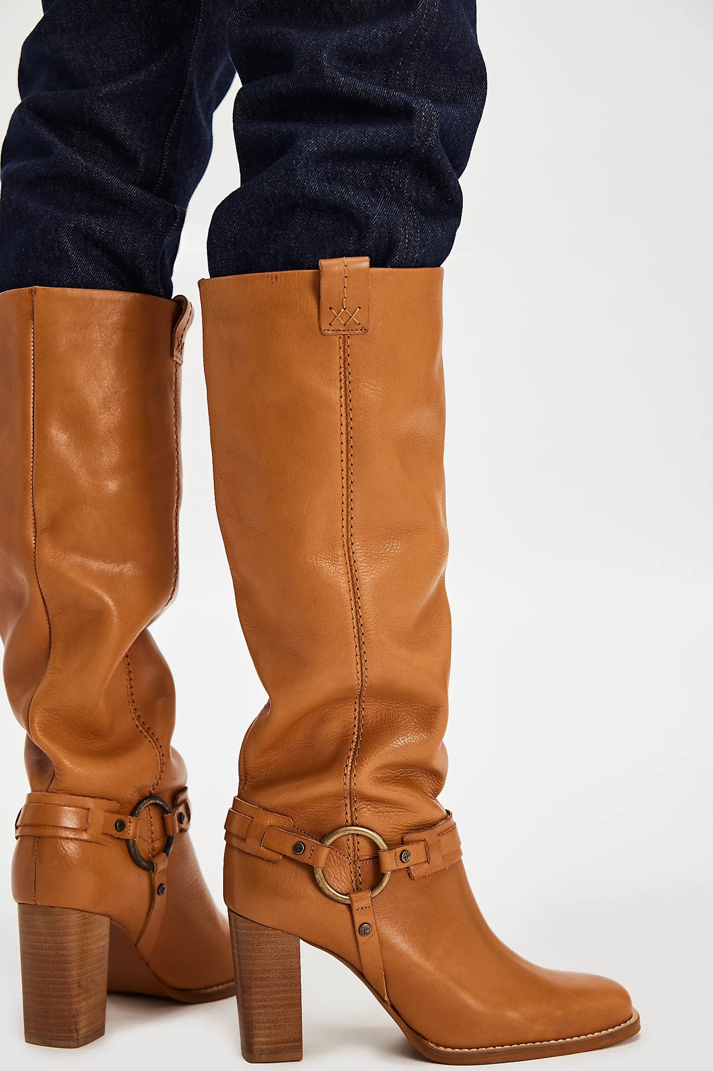 Embrace the classic cool style of these tall leather boots from Free People, now at Harbour Thread boutique