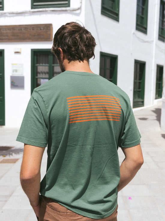 back view of men's green short sleeve pocket t-shirt with an orange horizontal line design
