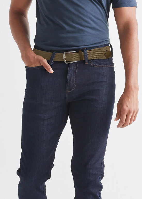 Front view of man wearing the Performance Stretch Belt by DU/ER