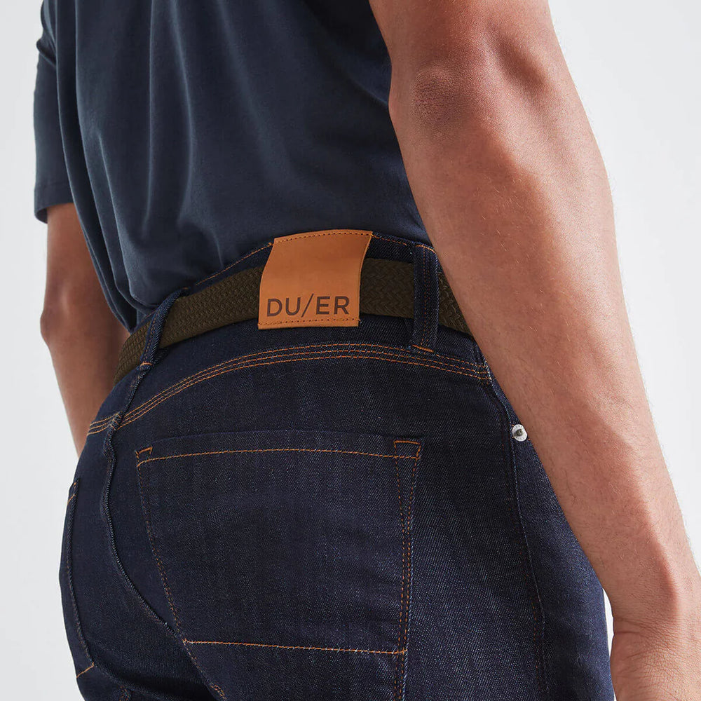 Back view of man wearing the Performance Stretch Belt by DU/ER