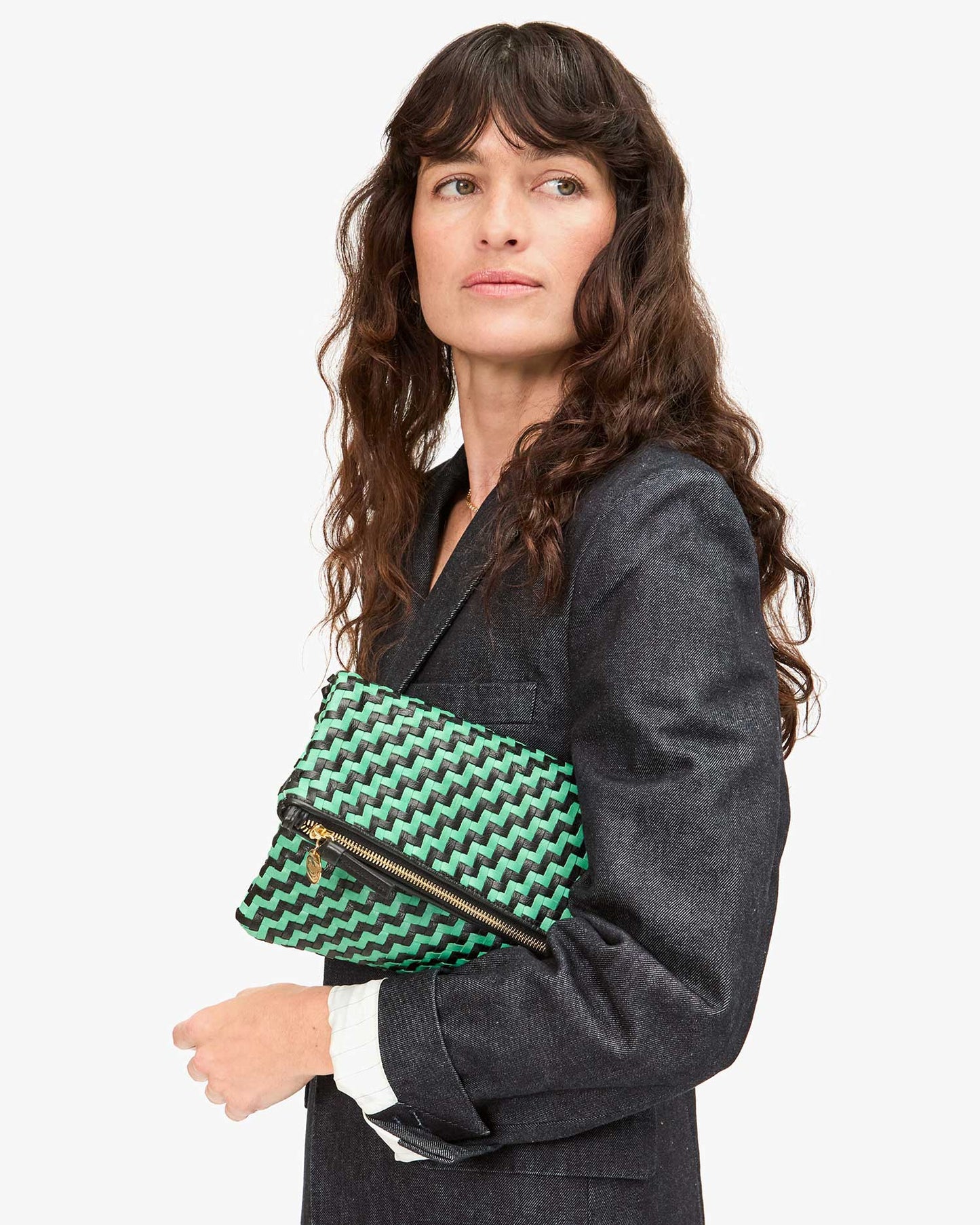 This foldover clutch from Clare V. is crafted from handwoven leather